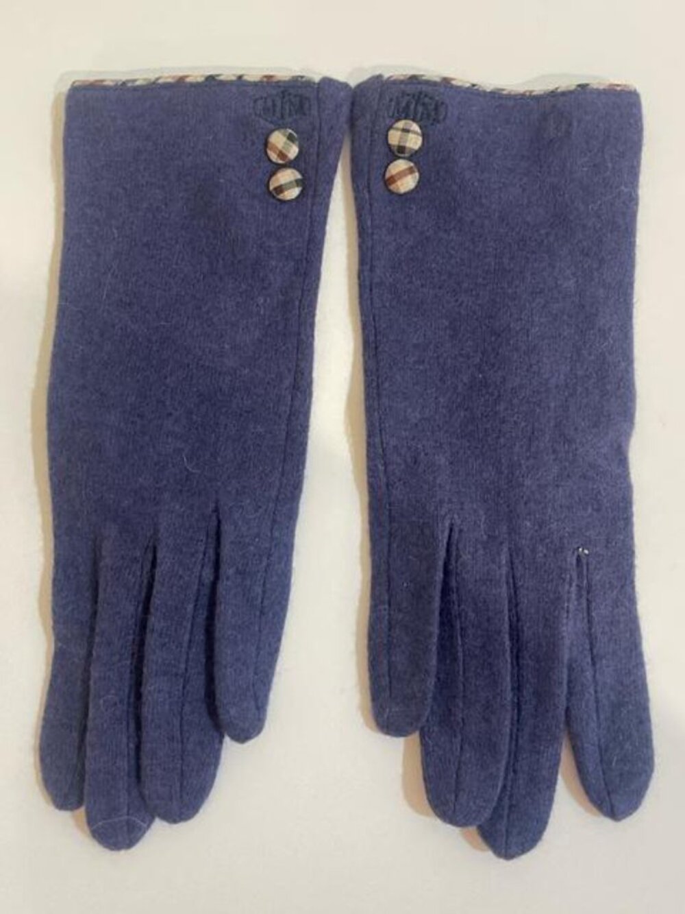 Blue wool gloves with plaid buttons